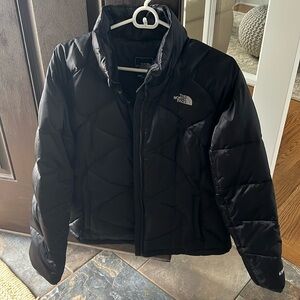 The north face puffer jacket large. Black. Comes from smoke free home.
